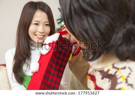 Japanese woman receiving gifts from her boyfriend