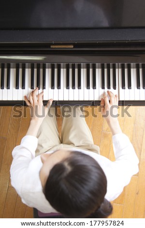 Female teachers playing the piano