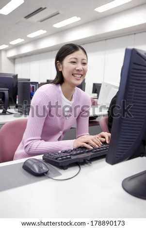 Japanese Student studying on a PC