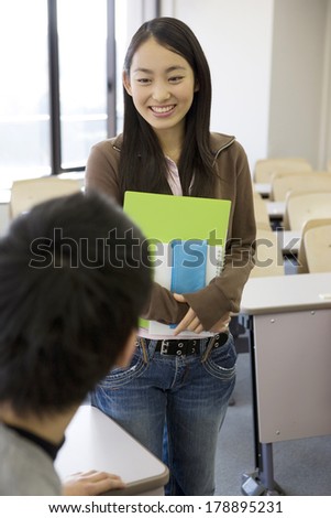 Japanese Students discussing in the classroom