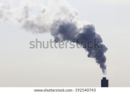 An image of Water vapor containing gas coming out of the chimney