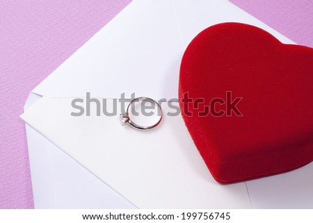 Small Red Heart-Shaped Box And The Diamond Ring