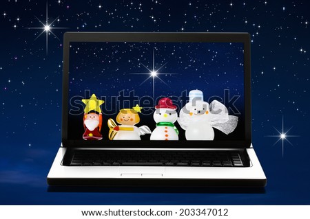 Dolls Of Christmas Reflected In The Personal Computer