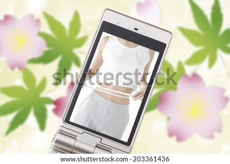 Waist Of A Woman Captured In A Mobile Screen