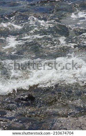Bubbles Of Tidal Waves Flooding Into A Shallow Cape