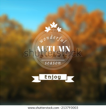 Poster with autumn landscape. Motto, slogan for autumn season. Maple leaves on a autumn forest background. Emblem for autumn poster. Circle emblem of wonderful autumn season on a photo background.