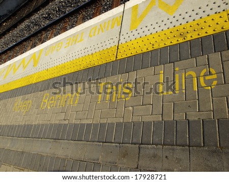 yellow warning line in trains station