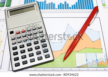 business strategy using color charts and  calculator.
