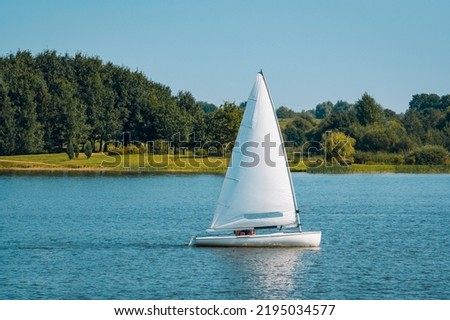 Similar – Image, Stock Photo Sailboats in a small harbour at the lake