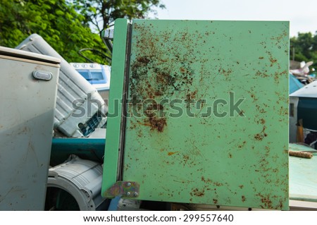 Suratthani,Thailand, July 24,2015:Old refrigerator that is broken or breaking the pile at the plant waste for recycling.