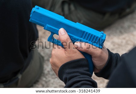 police practice of using armed tactical pistol.