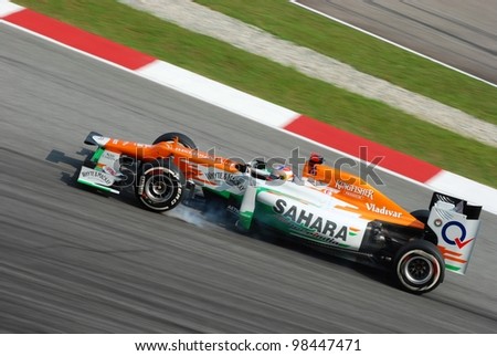 SEPANG, MALAYSIA-MARCH 24 : Paul di Resta of Force India F1 Team brakes hard during qualifying session at PETRONAS Malaysian Grand Prix on March 24, 2012 in Sepang, Malaysia.