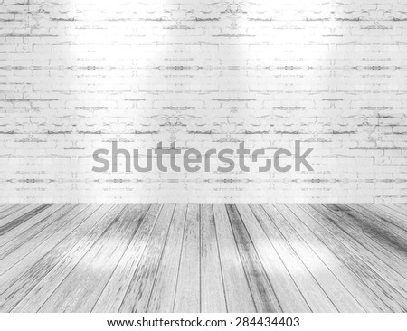 room interior with light shining down on the floor,white brick wall and wood floor background.