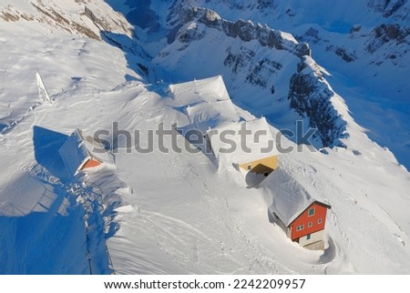 Snowed guesthouses on the top of Saentis - Kanton of Apenzell, Ausserrhoden, Switzerland, Europe. Stockfoto © 