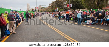 SANTA CRUZ, SPAIN - FEB 12: viewers awaiting  the carnival parade for one of the most important carnivals in the world on February 12, 2013 in Santa Cruz de Tenerife, Spain
