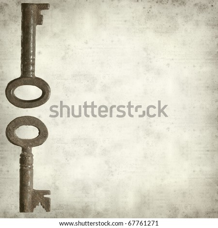 textured old paper background with old rusty antique metal key