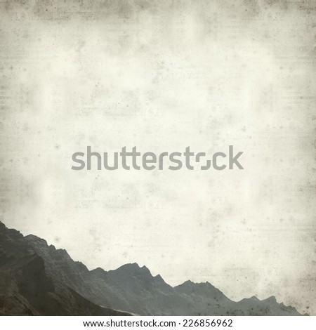 textured old paper background with mountains of Gran Canaria