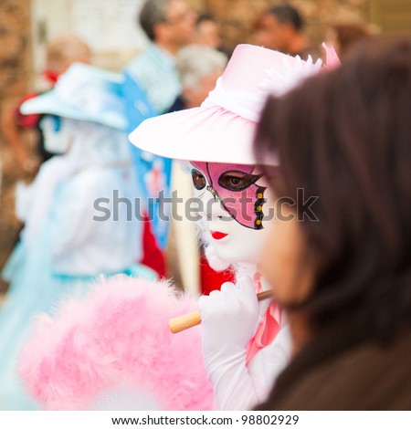 CORRALEJO - MARCH 17: Participants in venetian-style costumes r Grand Carnival Parade, March 17, 2012 in Corralejo, Fuerteventura, Spain
