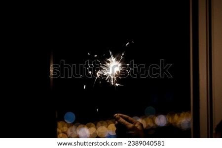 Similar – Image, Stock Photo Sparkler against blurred person in nature