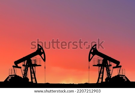 Crude oil Pumpjack on sunset. Fossil crude output and fuels oil production. Oil drill rig and drilling derrick. Global crude oil Prices, energy, petroleum demand (OPEC+). Pump jack at oilfield. Stockfoto © 