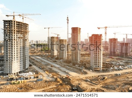 Similar – Image, Stock Photo Skyscraper building construction. Crane working in construction site. Property and real estate development industry. Apartment building construction. Background for REIT fund. Building for rent.