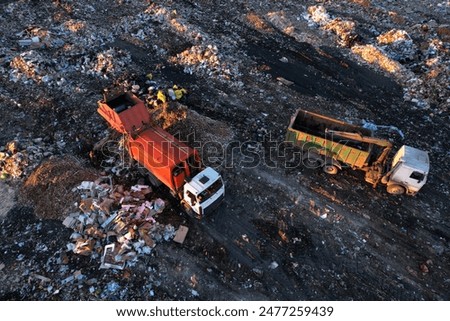 Similar – Foto Bild Eine Mülldeponie in einem ländlichen Gebiet.