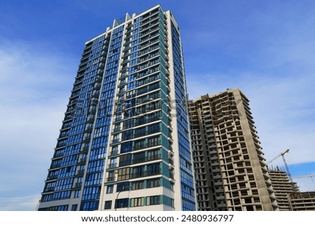 Similar – Foto Bild Fassade eines Wohnhaus in Beige und Naturfarben im Licht der Abendsonne am Abend im Stadtteil Bornheim in Frankfurt am Main in Hessen