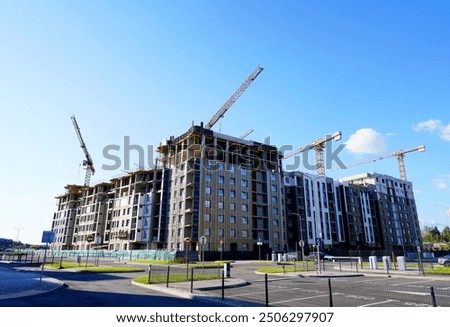 Similar – Image, Stock Photo A construction site is secured by green plastic barrier beacons / lane narrowing / construction fence