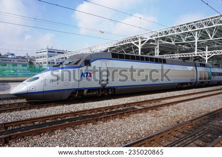SEOUL, SOUTH KOREA --25 OCTOBER 2014-- High-speed bullet trains (KTX) and Korail trains stop at the Seoul station in South Korea.