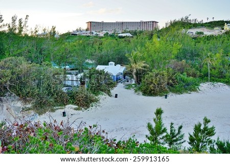 SOUTHAMPTON, BERMUDA -14 FEBRUARY 2015: Editorial: The pink Fairmont Southampton hotel on the South Shore of Bermuda overlooks green hills and beaches with turquoise water and pink sand.