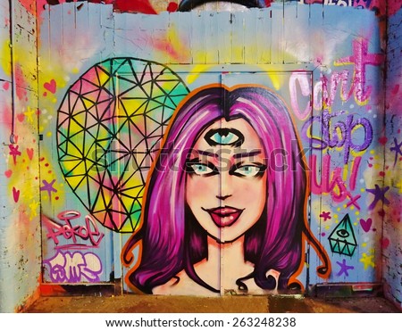 LONDON, ENGLAND -12 MARCH 2015- Editorial: On March 8, the Femme Fierce female street artist collective took over the Leake Street Graffiti Tunnel in honor of International Womens Day.