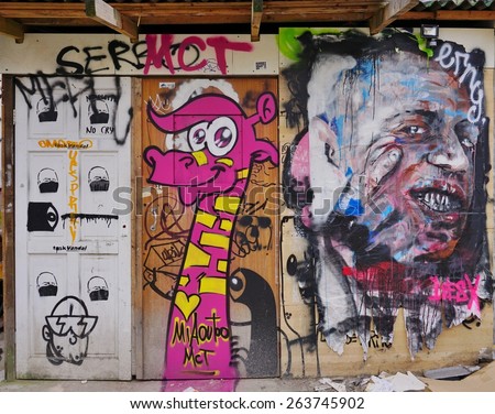 LONDON, ENGLAND -12 MARCH 2015- Editorial: Painted walls and graffiti art are scattered in the Brick Lane area in East London in the heart of Banglatown.