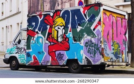PARIS, FRANCE -26 FEBRUARY 2015- Editorial: Paris has become one of the European capitals for graffiti street art. Many delivery trucks are spray painted with colorful graffiti tags.
