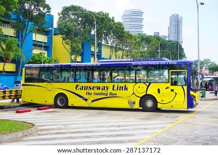 SINGAPORE -17 APRIL 2015- The Causeway Link buses operate public bus service between Malaysia and Singapore. Most Malay day workers to Singapore commute by bus.