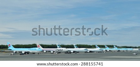 ANCHORAGE, AK -22 MAY 2015- Cargo jumbo jet planes are lined up at the Ted Stevens Anchorage International Airport (ANC) in Alaska.