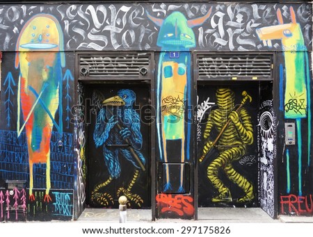 PARIS, FRANCE -15 JUNE 2015- Graffiti art line the street walls and back alleys of the Belleville neighborhood between the 11th and 20th arrondissements of the French capital.