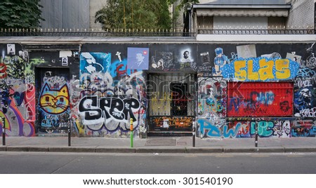 PARIS, FRANCE -8 JULY 2015- The former house of famous French singer Serge Gainsbourg on rue de Verneuil in the 7th arrondissement of Paris is covered with graffiti by fans.