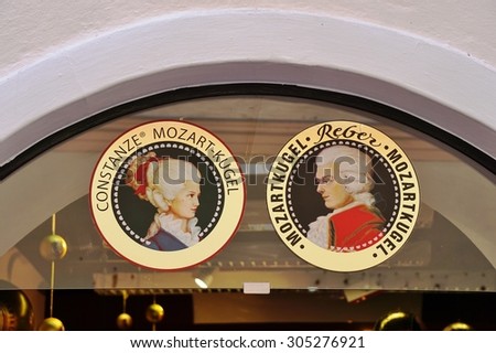 SALZBURG, AUSTRIA -25 JUNE 2015- Famous Austrian composer Wolfgang Amadeus Mozart appears on many tourist souvenirs and restaurants in Salzburg.