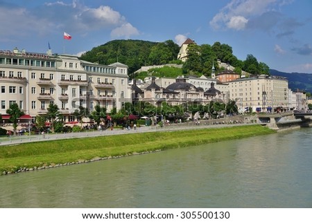 SALZBURG, AUSTRIA -25 JUNE 2015- The historic landmark Hotel Sacher, on the bank of the Salzach river, is the most luxurious hotel in Salzburg.