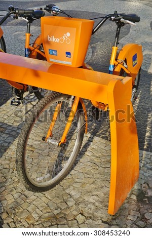 RIO DE JANEIRO, BRAZIL -25 JULY 2015- Bike Rio offers shared bicycles through the SAMBA public bike system. The orange Itau bikes are available for rent throughout Rio de Janeiro.