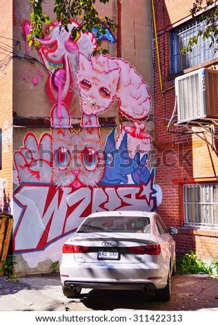MONTREAL, CANADA -18 AUGUST 2015- Creative graffiti street art murals line the streets and back alleys of Montreal, the largest city in Quebec, especially along Boulevard Saint-Laurent.