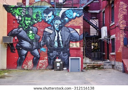 MONTREAL, CANADA -18 AUGUST 2015- Creative graffiti street art murals line the streets and back alleys of Montreal, the largest city in Quebec, especially along Boulevard Saint-Laurent.