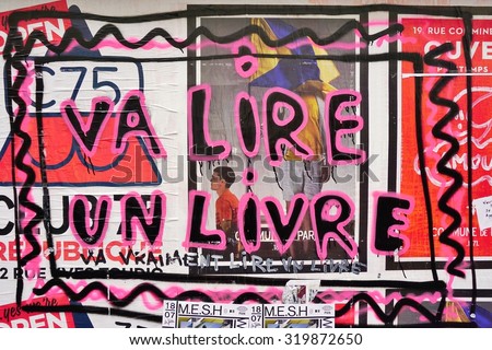 PARIS, FRANCE -16 JUNE 2015- Va Lire Un Livre graffiti street art in the French capital. Paris has become one of the European centers for street art.