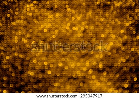 Elegant gold fabric texture background,close up sparkle glitter for design