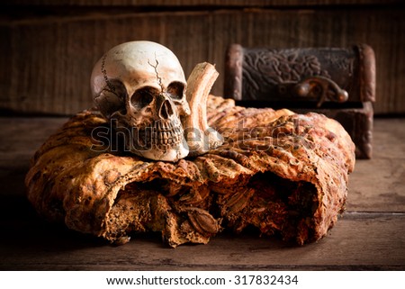 Still life photography skull and pumpkin on wood,Still life ,