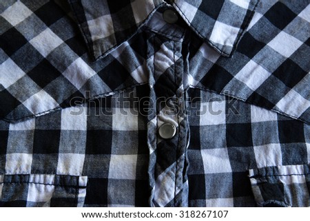 Black and white cotton plaid shirt closeup