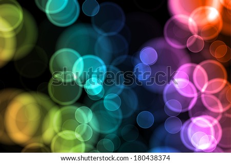 Colorful bokeh circles on a black background, mean clear the mind happy.