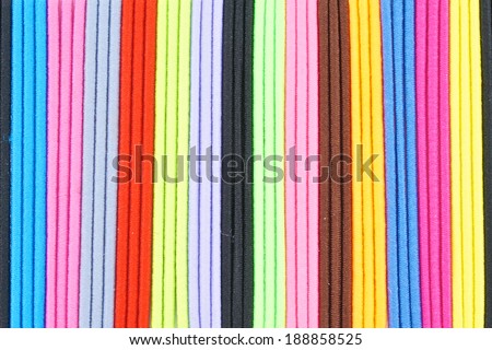 Colorful hair band made from  elastic rubber place as pattern.