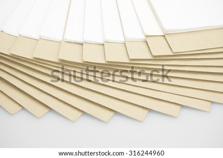 Step paper of report and brown envelope on top with white background.