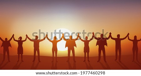 Concept of solidarity and union with men and women who join hands to form a human chain.